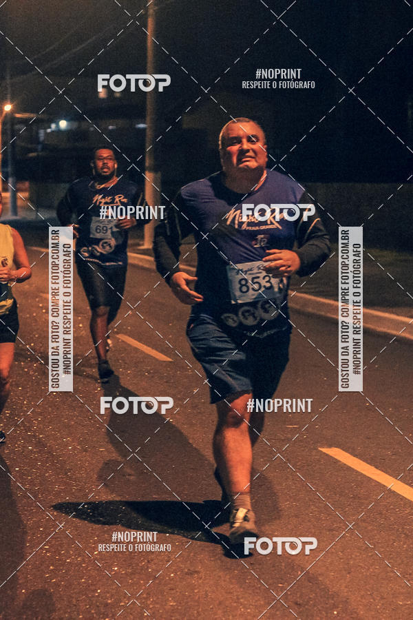 Buy your photos of the eventNight Run 5K 10K Praia Grande on Fotop