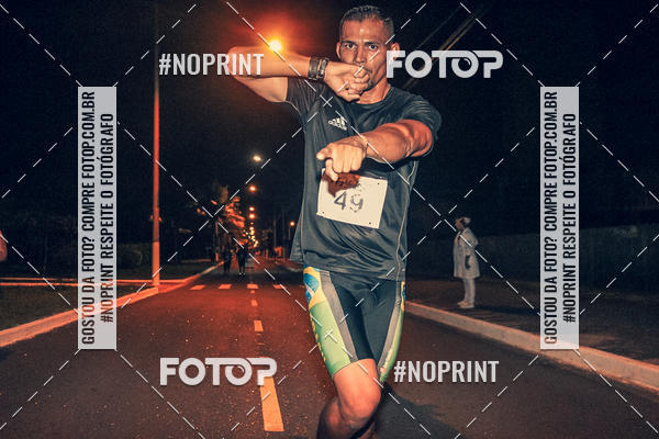 Buy your photos of the eventNight Run 5K 10K Praia Grande on Fotop