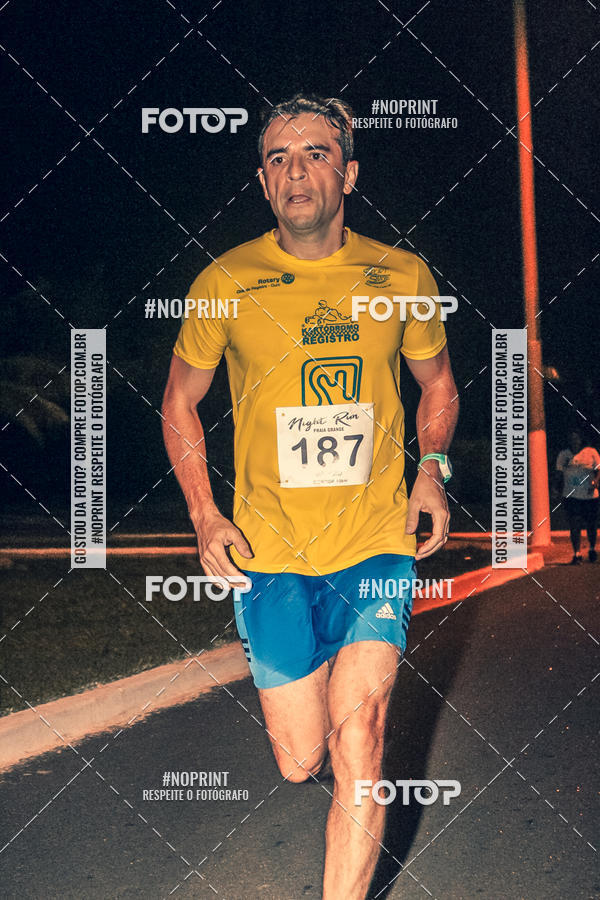 Buy your photos of the eventNight Run 5K 10K Praia Grande on Fotop
