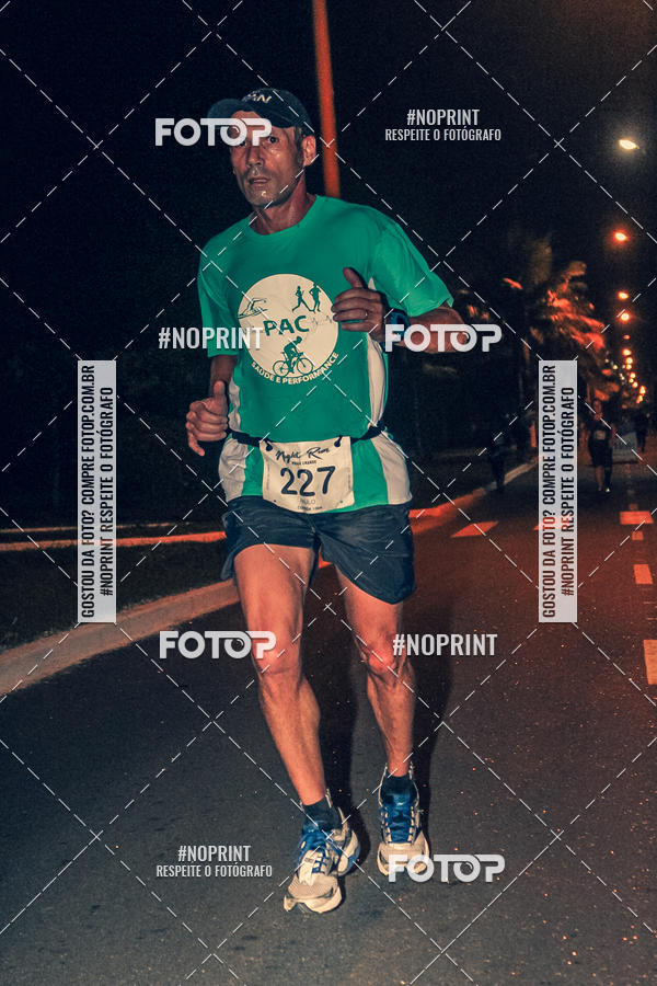 Buy your photos of the eventNight Run 5K 10K Praia Grande on Fotop