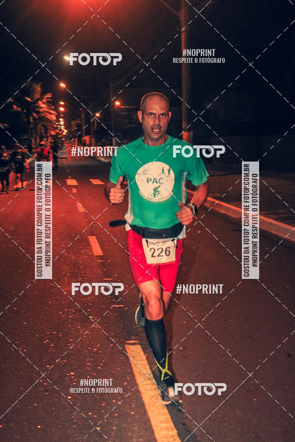 Buy your photos of the eventNight Run 5K 10K Praia Grande on Fotop