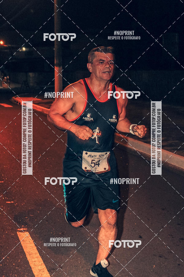 Buy your photos of the eventNight Run 5K 10K Praia Grande on Fotop