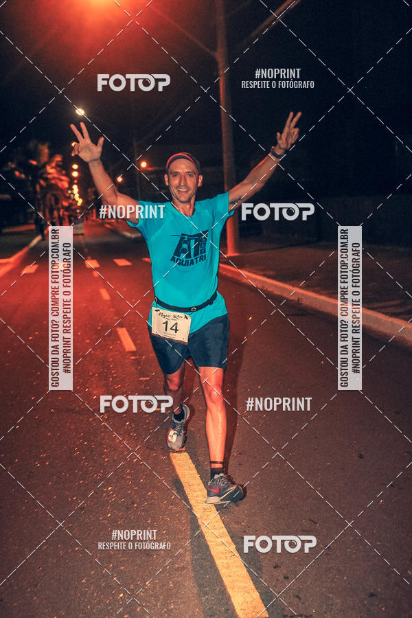 Buy your photos of the eventNight Run 5K 10K Praia Grande on Fotop