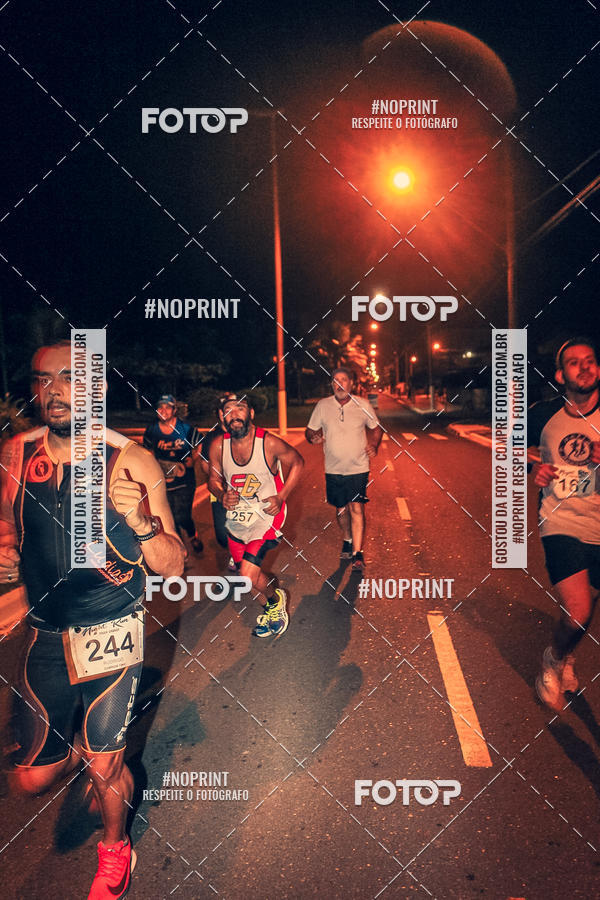 Buy your photos of the eventNight Run 5K 10K Praia Grande on Fotop