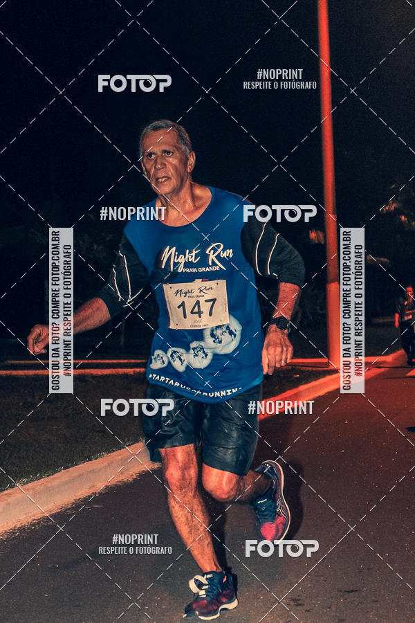 Buy your photos of the eventNight Run 5K 10K Praia Grande on Fotop