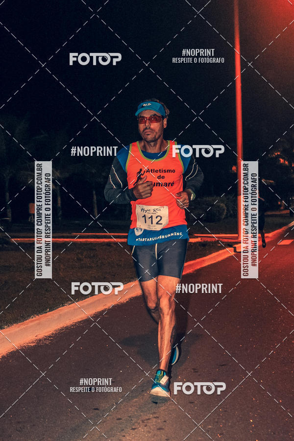 Buy your photos of the eventNight Run 5K 10K Praia Grande on Fotop