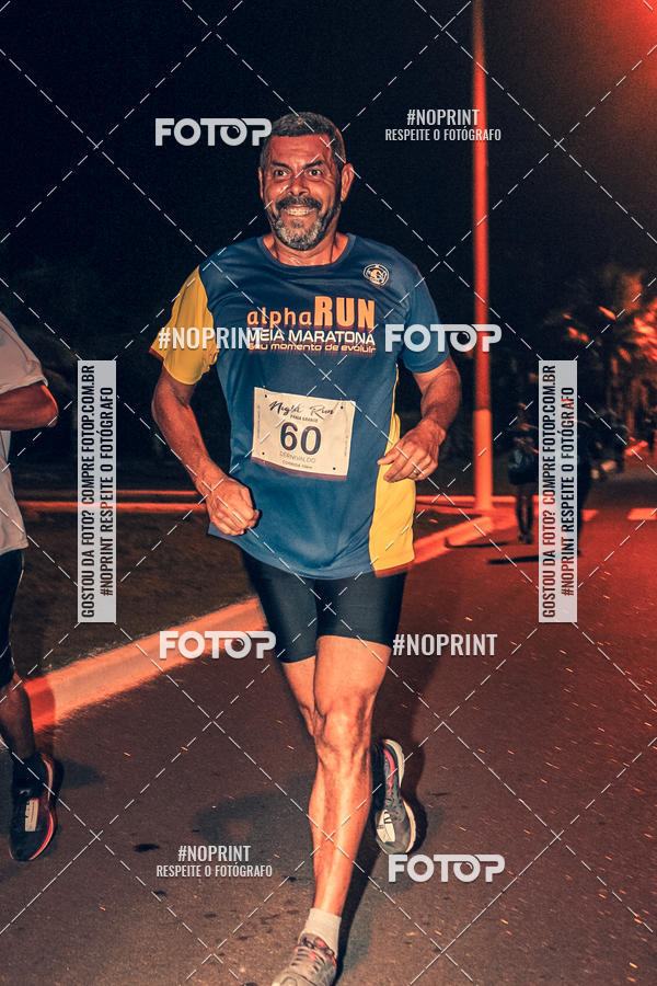 Buy your photos of the eventNight Run 5K 10K Praia Grande on Fotop