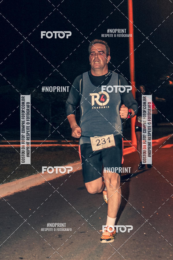 Buy your photos of the eventNight Run 5K 10K Praia Grande on Fotop