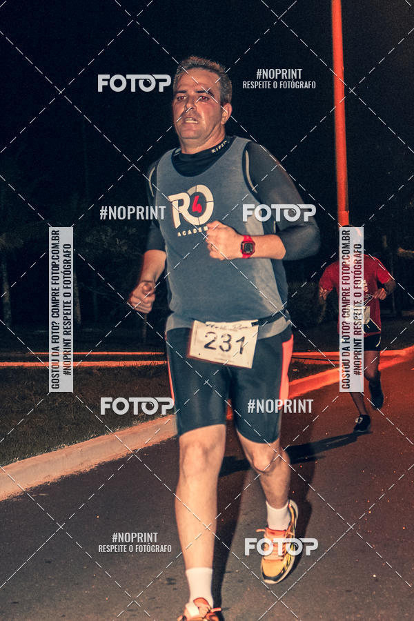 Buy your photos of the eventNight Run 5K 10K Praia Grande on Fotop
