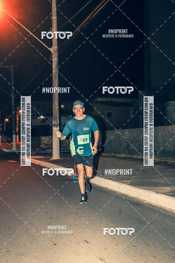Buy your photos of the eventNight Run 5K 10K Praia Grande on Fotop
