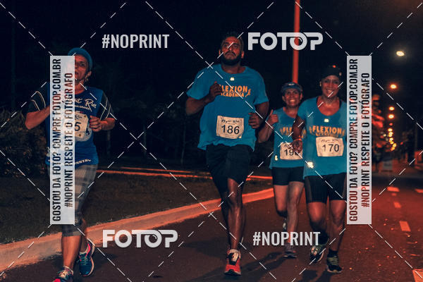 Buy your photos of the eventNight Run 5K 10K Praia Grande on Fotop