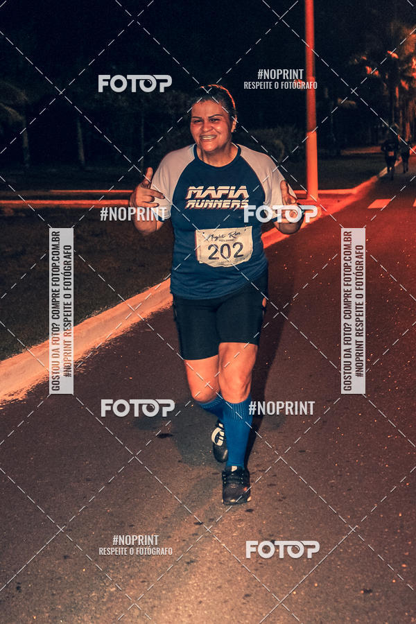 Buy your photos of the eventNight Run 5K 10K Praia Grande on Fotop