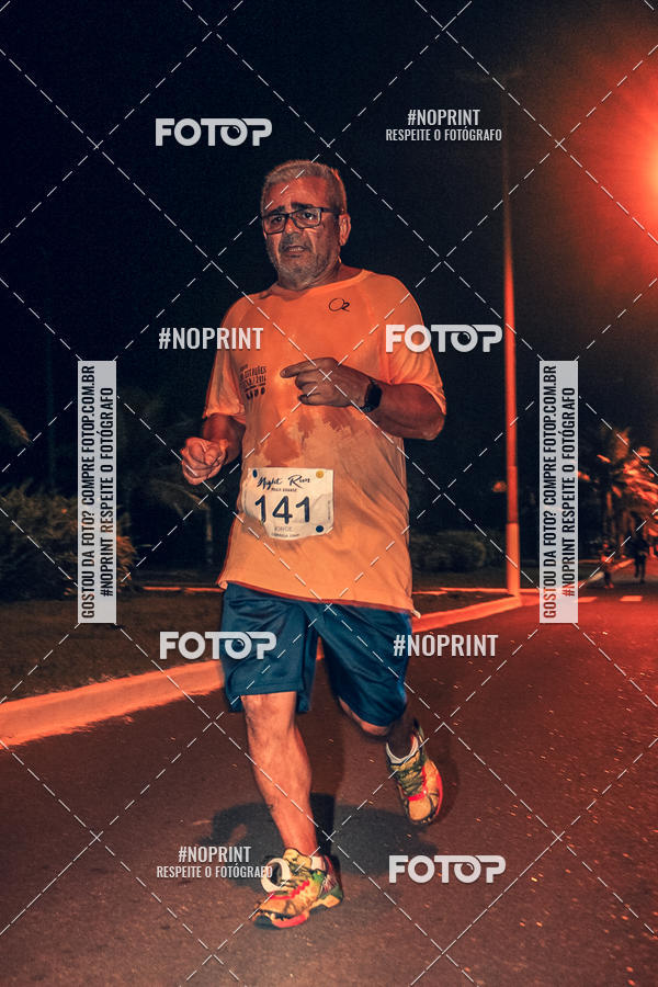 Buy your photos of the eventNight Run 5K 10K Praia Grande on Fotop