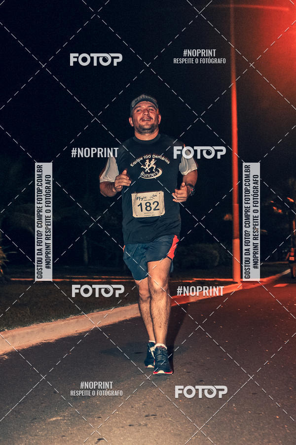 Buy your photos of the eventNight Run 5K 10K Praia Grande on Fotop