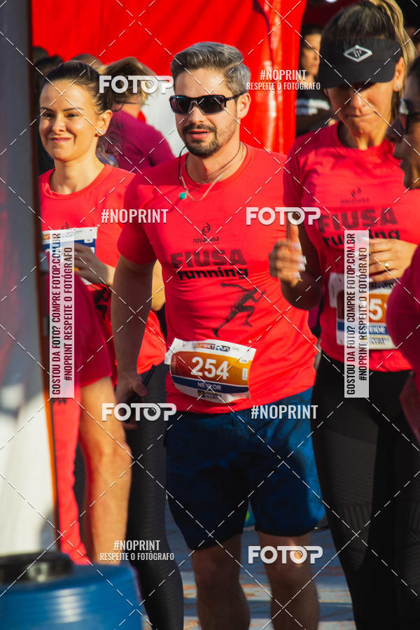 Compre as suas fotos do eventoSunset Run 2019 no Fotop