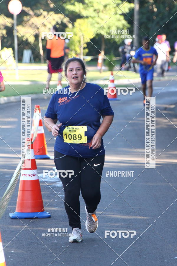 Compra tus fotos del eventoXIV Corrida UNICEP En Fotop