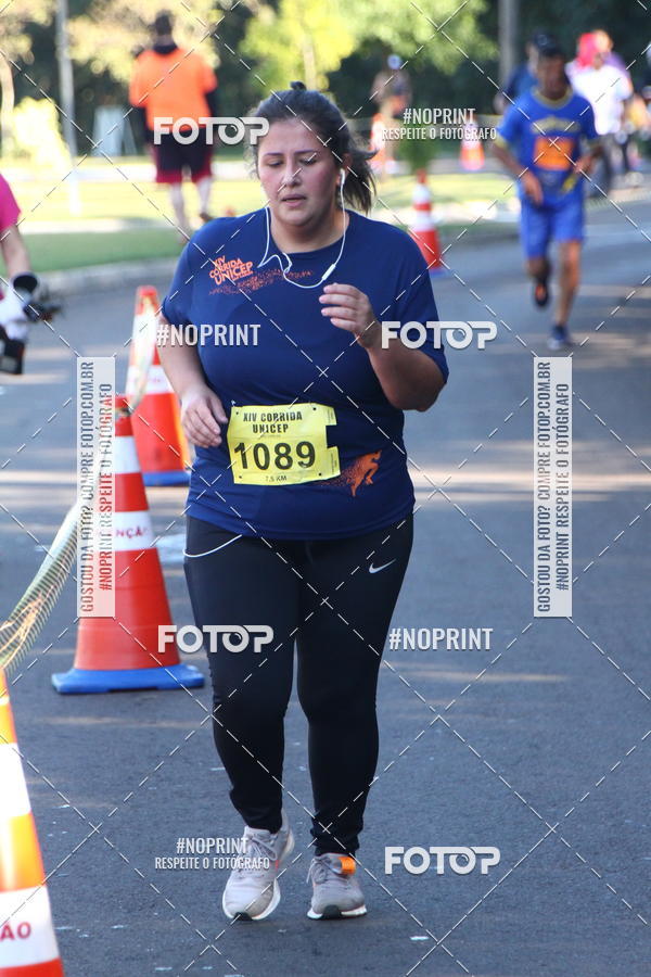 Compra tus fotos del eventoXIV Corrida UNICEP En Fotop