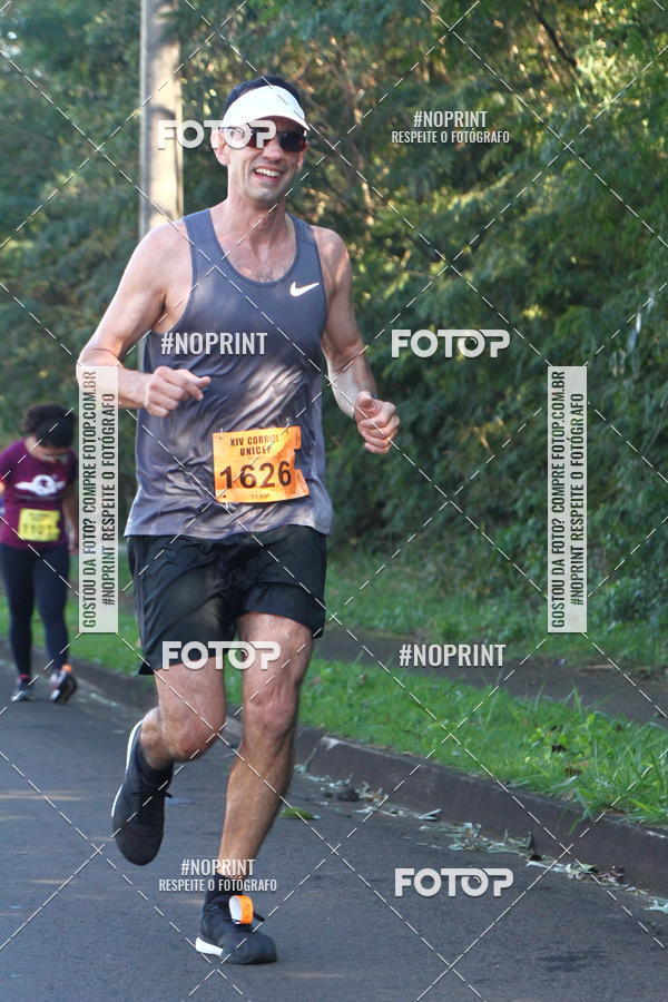 Compra tus fotos del eventoXIV Corrida UNICEP En Fotop