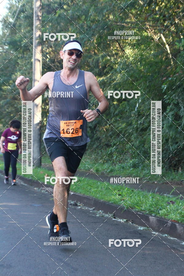 Compra tus fotos del eventoXIV Corrida UNICEP En Fotop