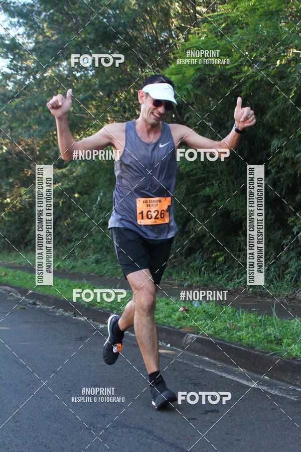 Compra tus fotos del eventoXIV Corrida UNICEP En Fotop