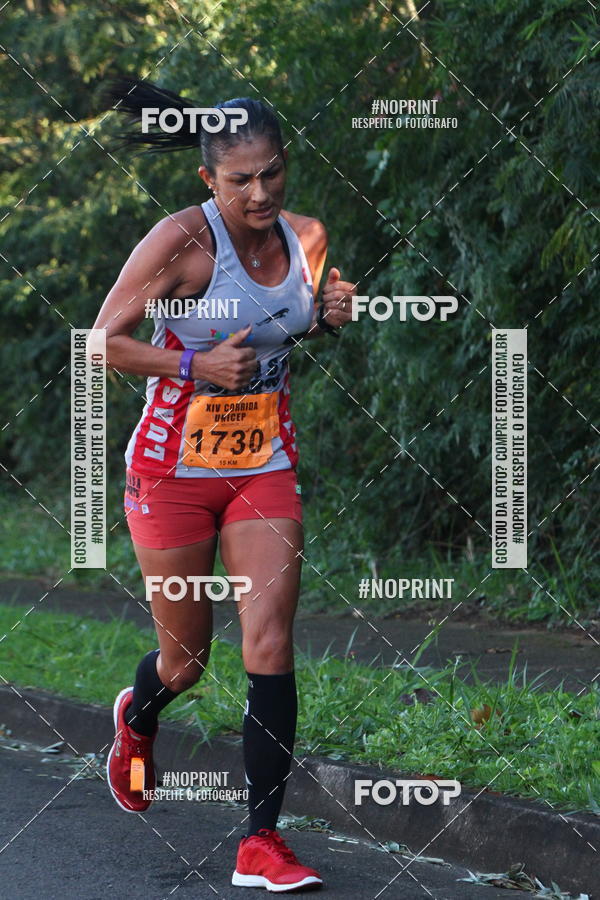 Compra tus fotos del eventoXIV Corrida UNICEP En Fotop