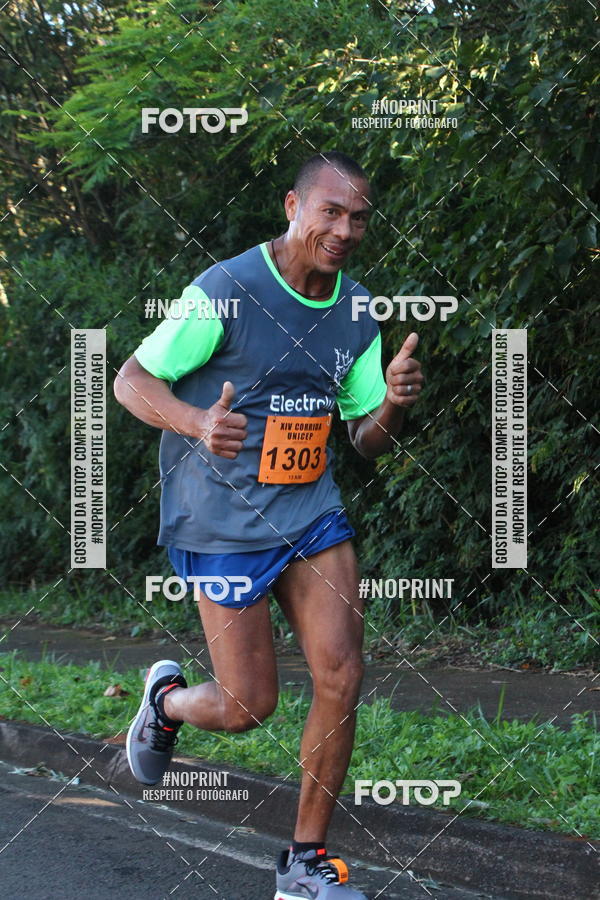 Compra tus fotos del eventoXIV Corrida UNICEP En Fotop