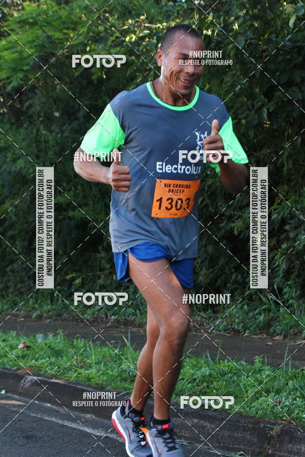Compra tus fotos del eventoXIV Corrida UNICEP En Fotop
