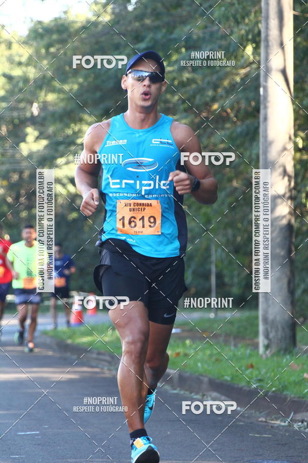 Compra tus fotos del eventoXIV Corrida UNICEP En Fotop