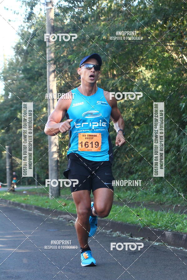 Compra tus fotos del eventoXIV Corrida UNICEP En Fotop