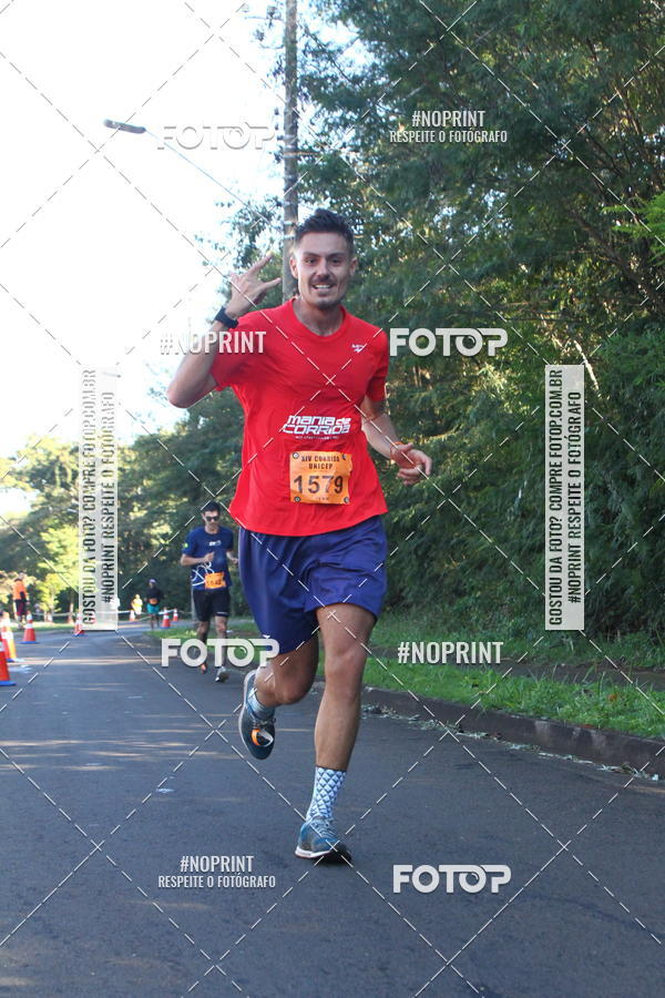 Compra tus fotos del eventoXIV Corrida UNICEP En Fotop