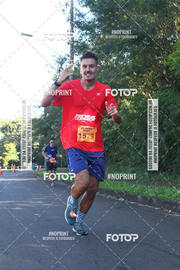 Compra tus fotos del eventoXIV Corrida UNICEP En Fotop