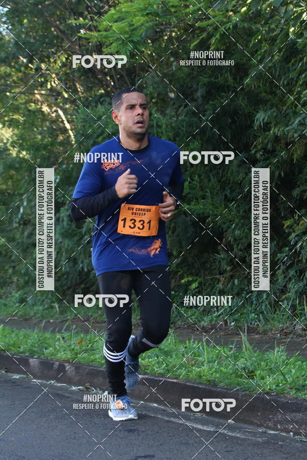 Compre suas fotos do eventoXIV Corrida UNICEP no Fotop