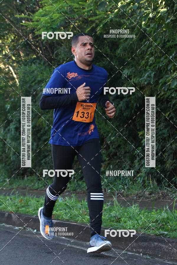 Compre suas fotos do eventoXIV Corrida UNICEP no Fotop