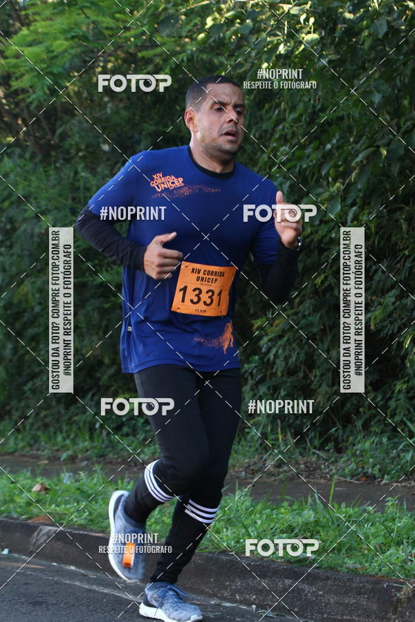 Compre suas fotos do eventoXIV Corrida UNICEP no Fotop