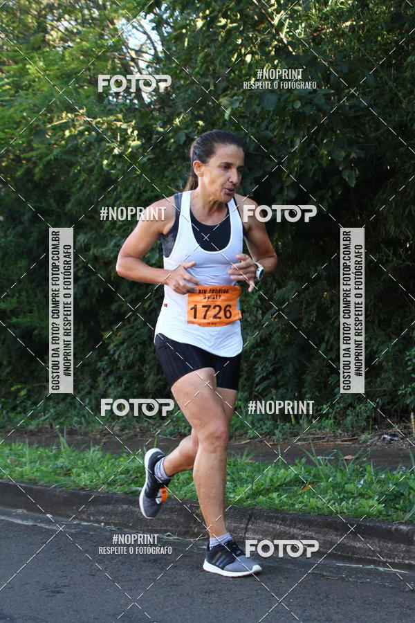 Compre suas fotos do eventoXIV Corrida UNICEP no Fotop