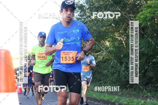 Compra tus fotos del eventoXIV Corrida UNICEP En Fotop