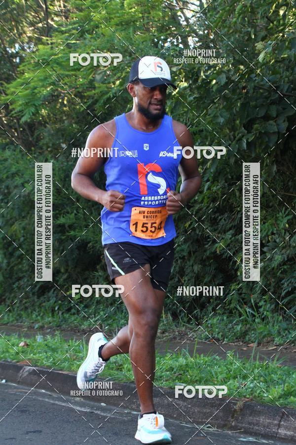 Compra tus fotos del eventoXIV Corrida UNICEP En Fotop