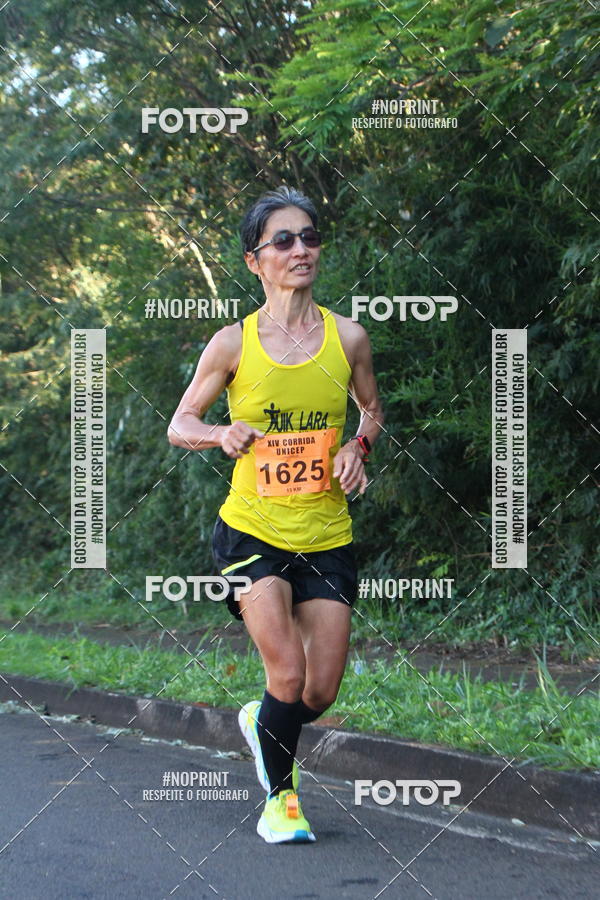 Compra tus fotos del eventoXIV Corrida UNICEP En Fotop