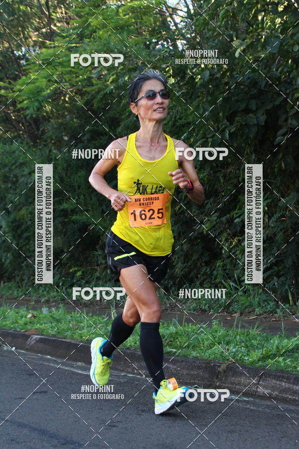 Compra tus fotos del eventoXIV Corrida UNICEP En Fotop