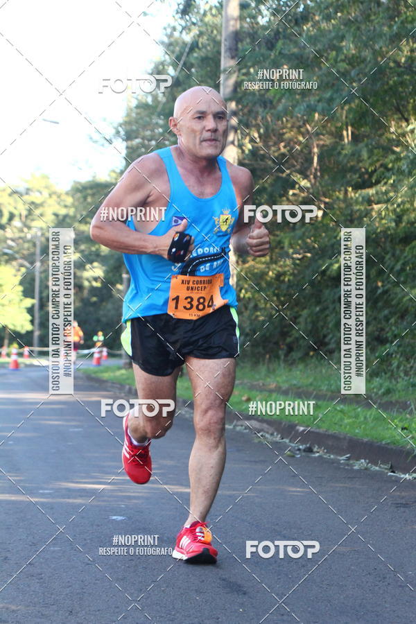 Compra tus fotos del eventoXIV Corrida UNICEP En Fotop