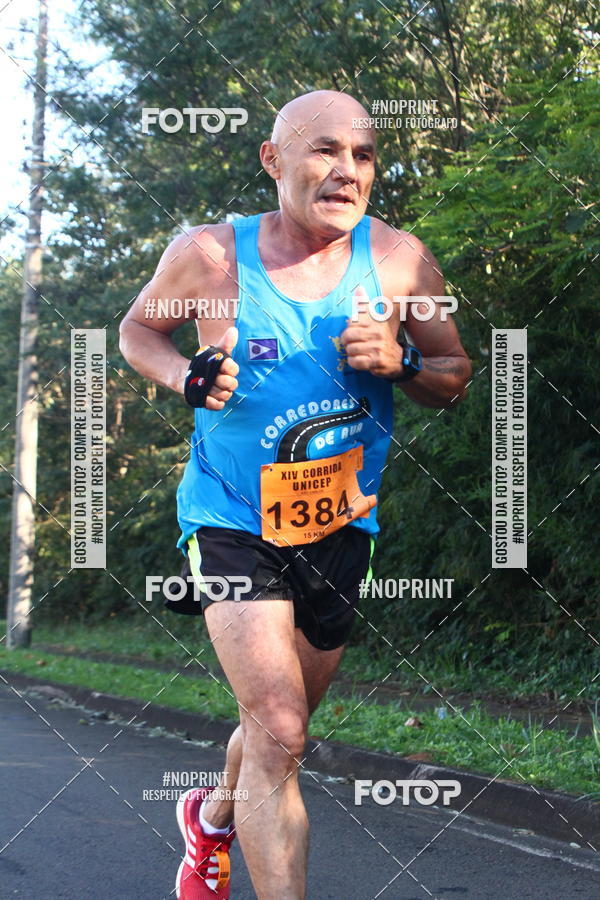 Compra tus fotos del eventoXIV Corrida UNICEP En Fotop