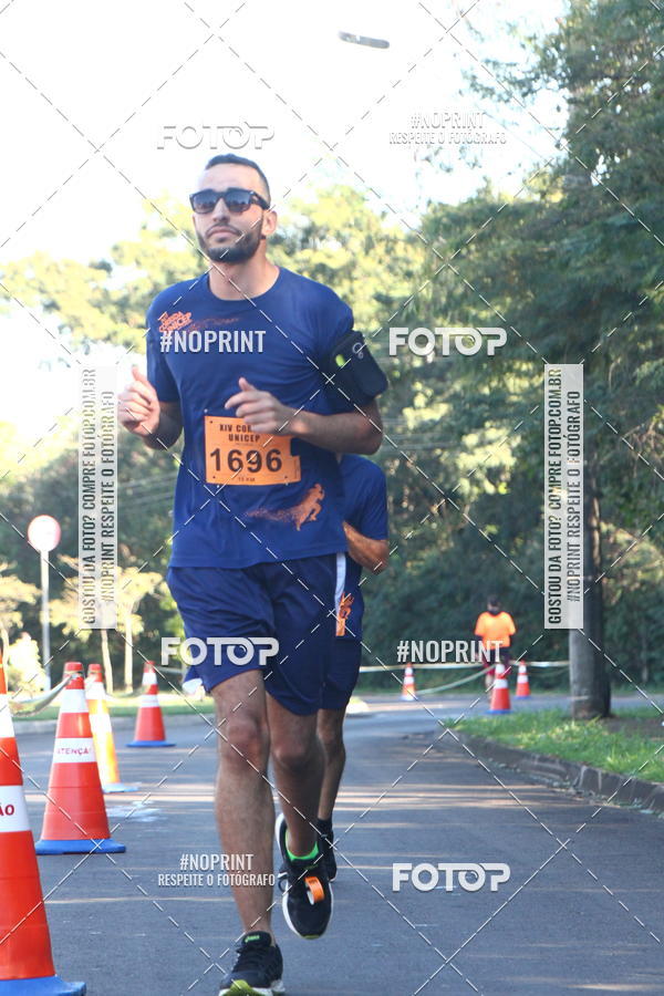 Compra tus fotos del eventoXIV Corrida UNICEP En Fotop