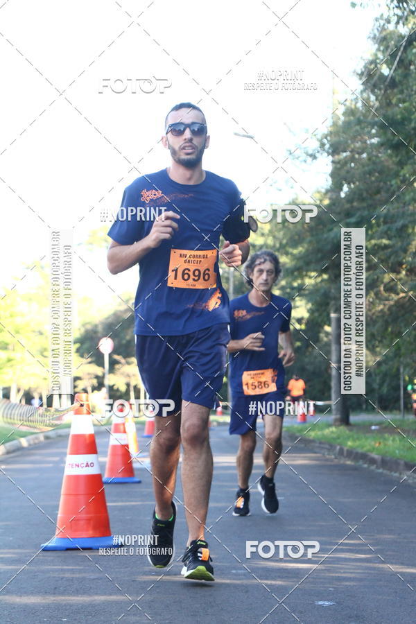 Compra tus fotos del eventoXIV Corrida UNICEP En Fotop