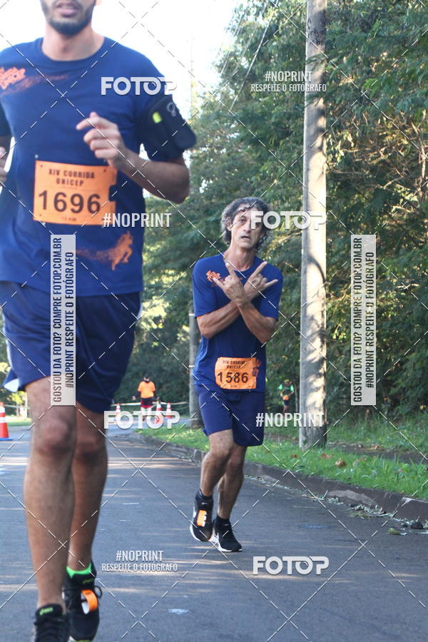 Compra tus fotos del eventoXIV Corrida UNICEP En Fotop