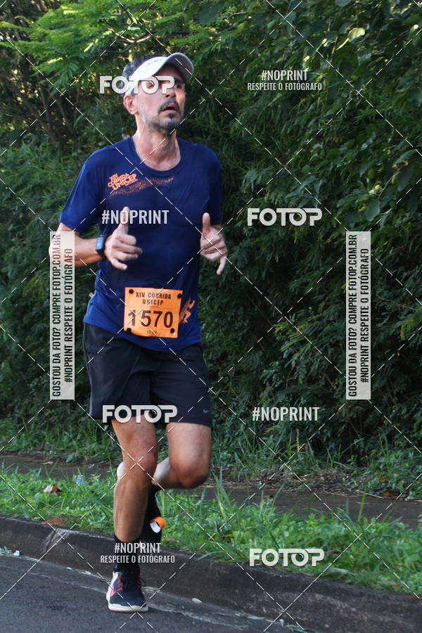 Compre as suas fotos do eventoXIV Corrida UNICEP no Fotop