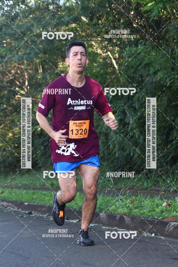 Compre as suas fotos do eventoXIV Corrida UNICEP no Fotop