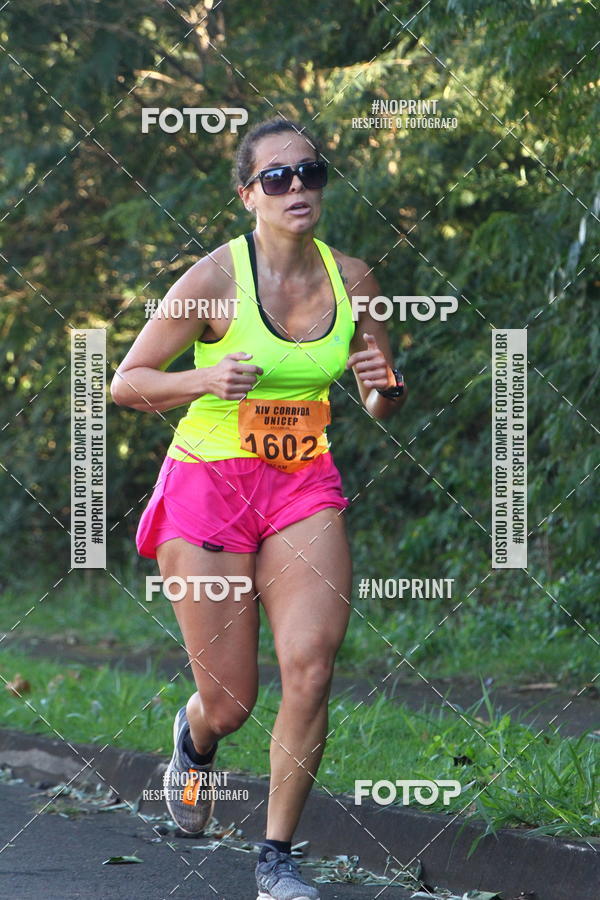 Compra tus fotos del eventoXIV Corrida UNICEP En Fotop