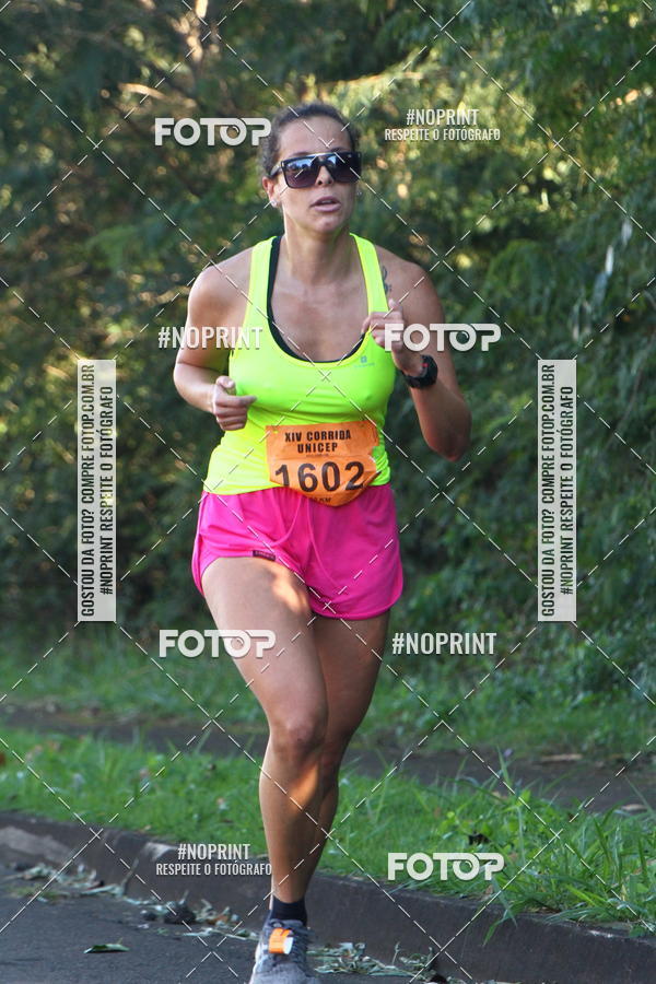 Compra tus fotos del eventoXIV Corrida UNICEP En Fotop