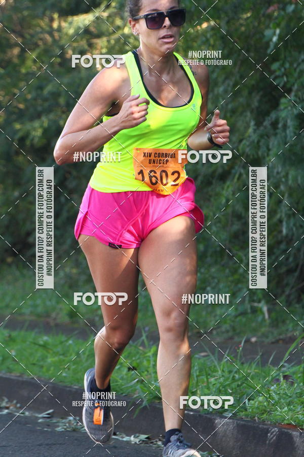 Compra tus fotos del eventoXIV Corrida UNICEP En Fotop