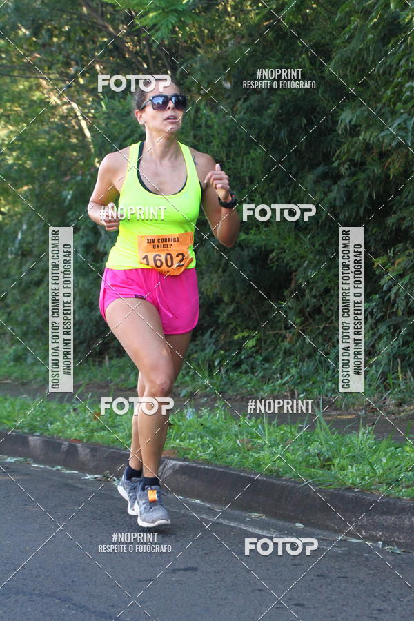 Compra tus fotos del eventoXIV Corrida UNICEP En Fotop
